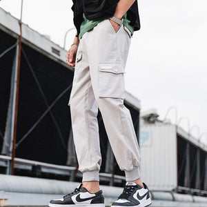 2019 Hip Hop Boy Multi-Bolsillo cintura elástica diseño Harem Pantalones Hombre Streetwear Punk Casual pantalones Jogger hombre baile pantalón negro